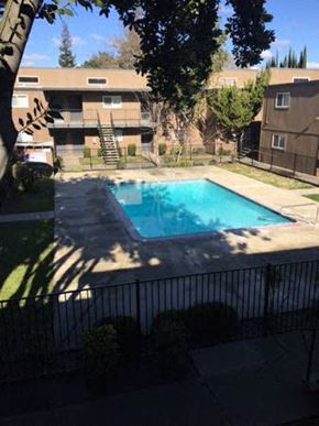 Stockton apartment for rent - Pool with lounge chairs 