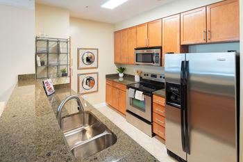 Maple cabinetry with brushed nickel pulls
