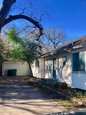 Denton house for rent - A house with a tree in front of it.