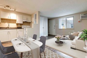 Denver apartment for rent - an open living room and kitchen with a dining table