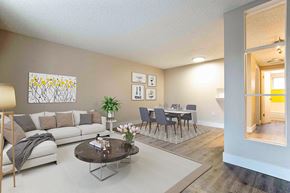 Denver apartment for rent - a living room with a couch and a table