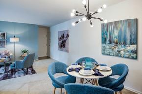 Alexandria apartment for rent - a dining room with a table and chairs and a chandelier