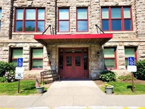 Albion apartment for rent - the front of a building with a red door