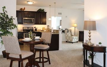 Nanticoke apartment for rent - a living room and kitchen with a table and chairs