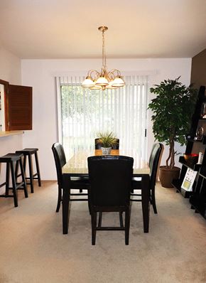 Harrisburg apartment for rent - a dining room with a table and chairs