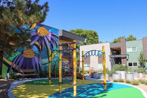 Lakewood apartment for rent - A playground with a slide and a climbing frame.