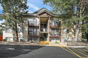 Lakewood apartment for rent - A building with a balcony and a black gate.