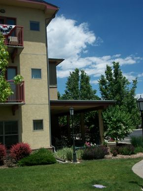 Lakewood apartment for rent - A building with a balcony and a small porch.