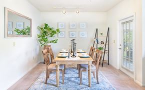 Centreville apartment for rent - a dining room with a wooden table and chairs
