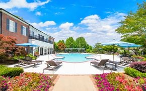 Smyrna apartment for rent - the preserve at ballantyne commons pool and patio with umbrellas