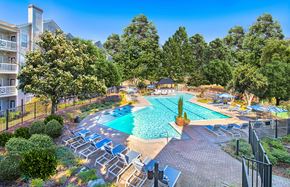 Atlanta apartment for rent - an aerial view of a swimming pool with lounge chairs