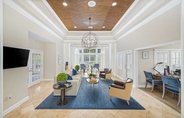 Charlotte apartment for rent - a living room with a couch and chairs and a table