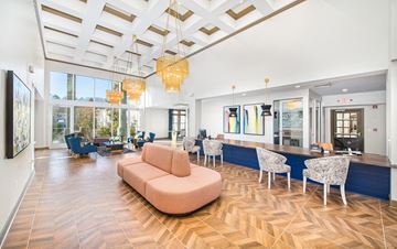 Atlanta apartment for rent - a living room with a couch and chairs and a large window