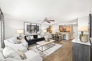 Atlanta apartment for rent - A living room with a white couch and a coffee table.