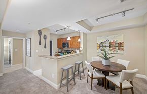 Atlanta apartment for rent - a dining area with a table and chairs next to a kitchen
