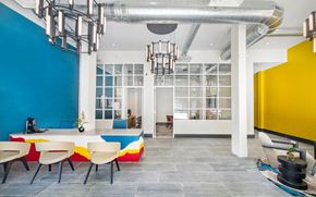 Atlanta apartment for rent - a dining room with blue and yellow walls and a table and chairs