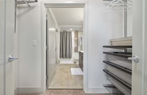Atlanta apartment for rent - a small hallway with a closet and a hall to a bedroom and a bathroom