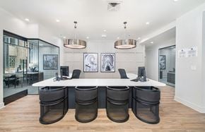 Charlotte apartment for rent - a conference room with a large white table and chairs