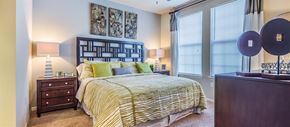 Windermere apartment for rent - a bedroom with a bed and a large window