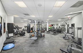 Washington apartment for rent - the gym is equipped with weights and cardio equipment at the belgard apartments