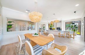 Tampa apartment for rent - a dining room with a wooden table and chairs