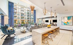 Houston apartment for rent - a living room with a kitchen and a large window