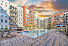 Denver apartment for rent - a swimming pool in the middle of an apartment building