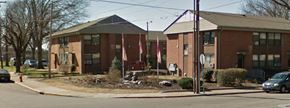 Nashville apartment for rent - a row of brick apartment buildings on the corner of a street