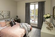 St. Louis Park apartment for rent - a bedroom with a bed and a large window