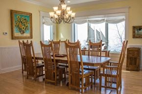 Harbor Springs house for rent - a dining room with a wooden table and chairs