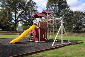 East Stroudsburg apartment for rent - a playground with a swing set and a slide