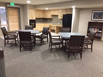 Coralville apartment for rent - a dining room and kitchen with a table and chairs