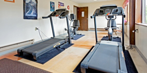 Two Rivers apartment for rent - A gym with treadmills and exercise equipment.