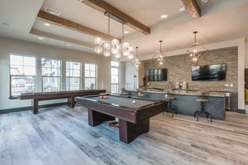 Resident lounge with billiards and shuffleboard