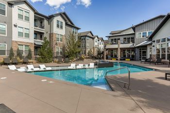 Expansive pool/spa area with tanning ledge