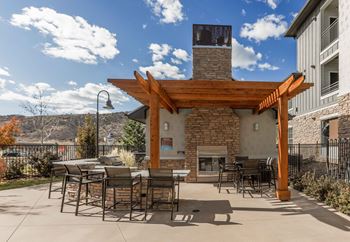 Outdoor kitchen with community sharing tables