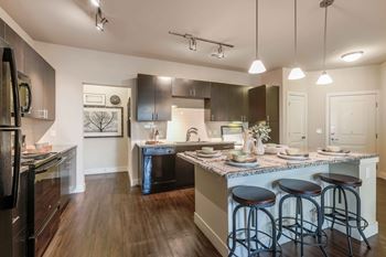 Wood style flooring and plush carpeting
