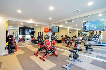 24-Hour cardio theater with free weights
