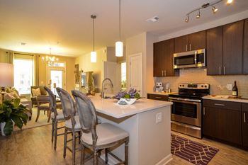 Gourmet kitchen with tile backsplash