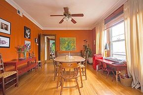 Chicago apartment for rent - A dining room with a table surrounded by chairs.