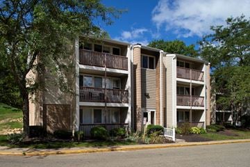 Akron apartment for rent - an exterior view of an apartment building on a city street
