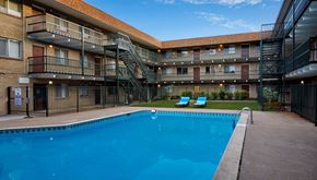 Littleton apartment for rent - a swimming pool in front of an apartment building
