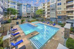 Atlanta apartment for rent - a swimming pool at an apartment building with an empty pool