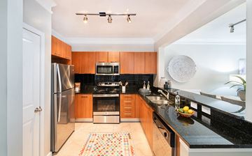Atlanta apartment for rent - a kitchen with granite counter tops and stainless steel appliances