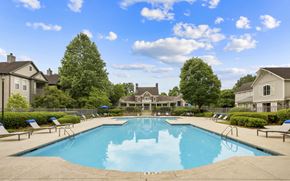 Duluth apartment for rent - A large swimming pool in the middle of a residential area.