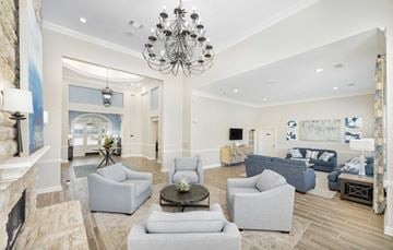 Duluth apartment for rent - a living room with couches and chairs and a chandelier