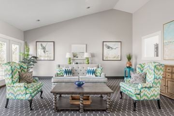 Canal Winchester apartment for rent - A living room with a patterned sofa and matching armchair.