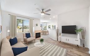 Gilbert apartment for rent - a living room with a couch and a tv