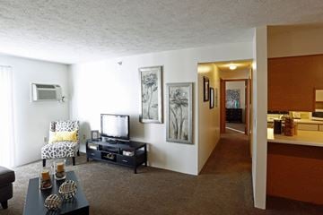 Marshall apartment for rent - A living room with a television and a chair.