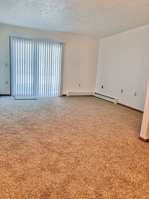 Gladwin apartment for rent - Living Room Foster Apartments 207 E May St Gladwin, MI 48624